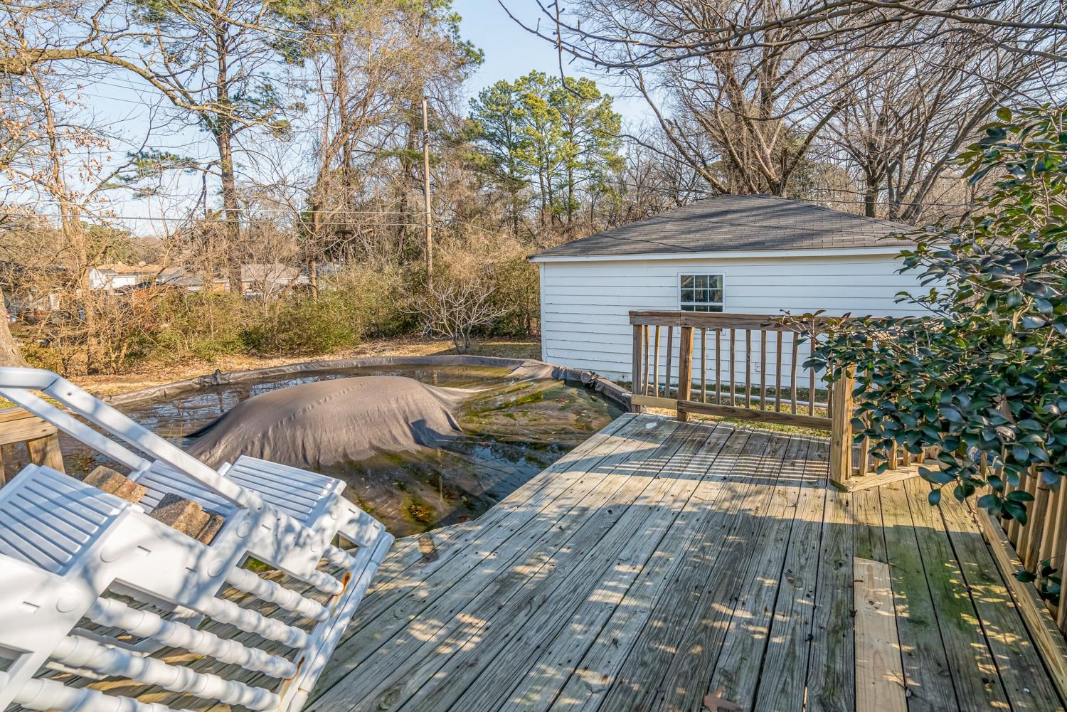 4430 Boyce Road Memphis, TN 38117 - Photo 25 of 25 a view of a backyard with wooden floor and fence and a large tree