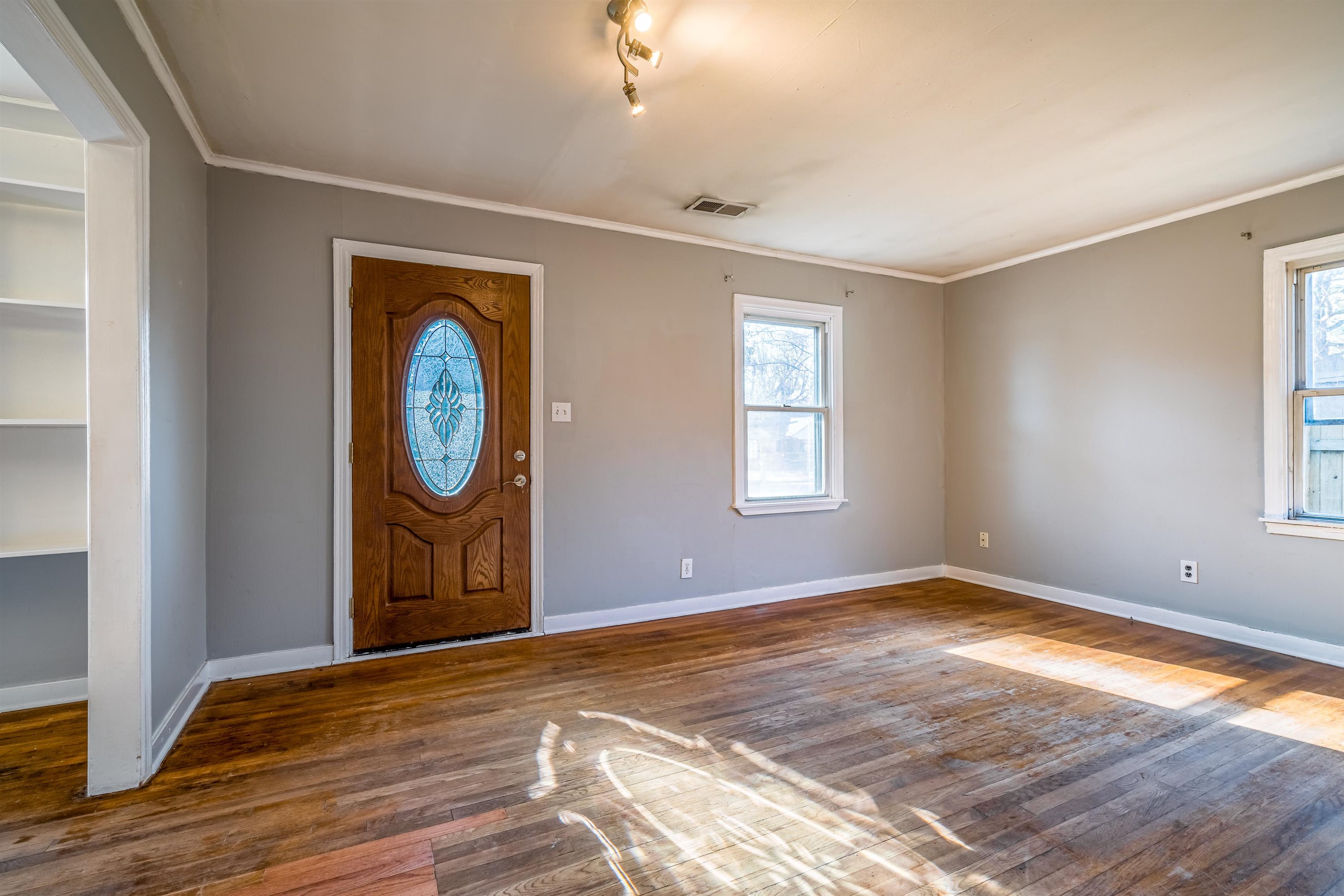 4430 Boyce Road Memphis, TN 38117 - Photo 6 of 25 a view of empty room with wooden floor
