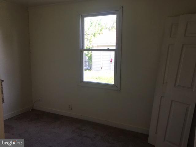 8102 Murray Point Road Baltimore, MD 21222 - Photo 4 of 14 first floor bedroom