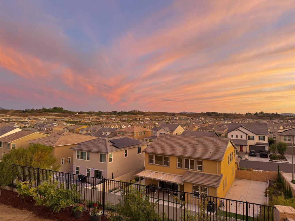 39529 Dayspring Way Temecula, CA 92591 - Photo 24 of 49 an aerial view of residential houses with outdoor space and ocean view