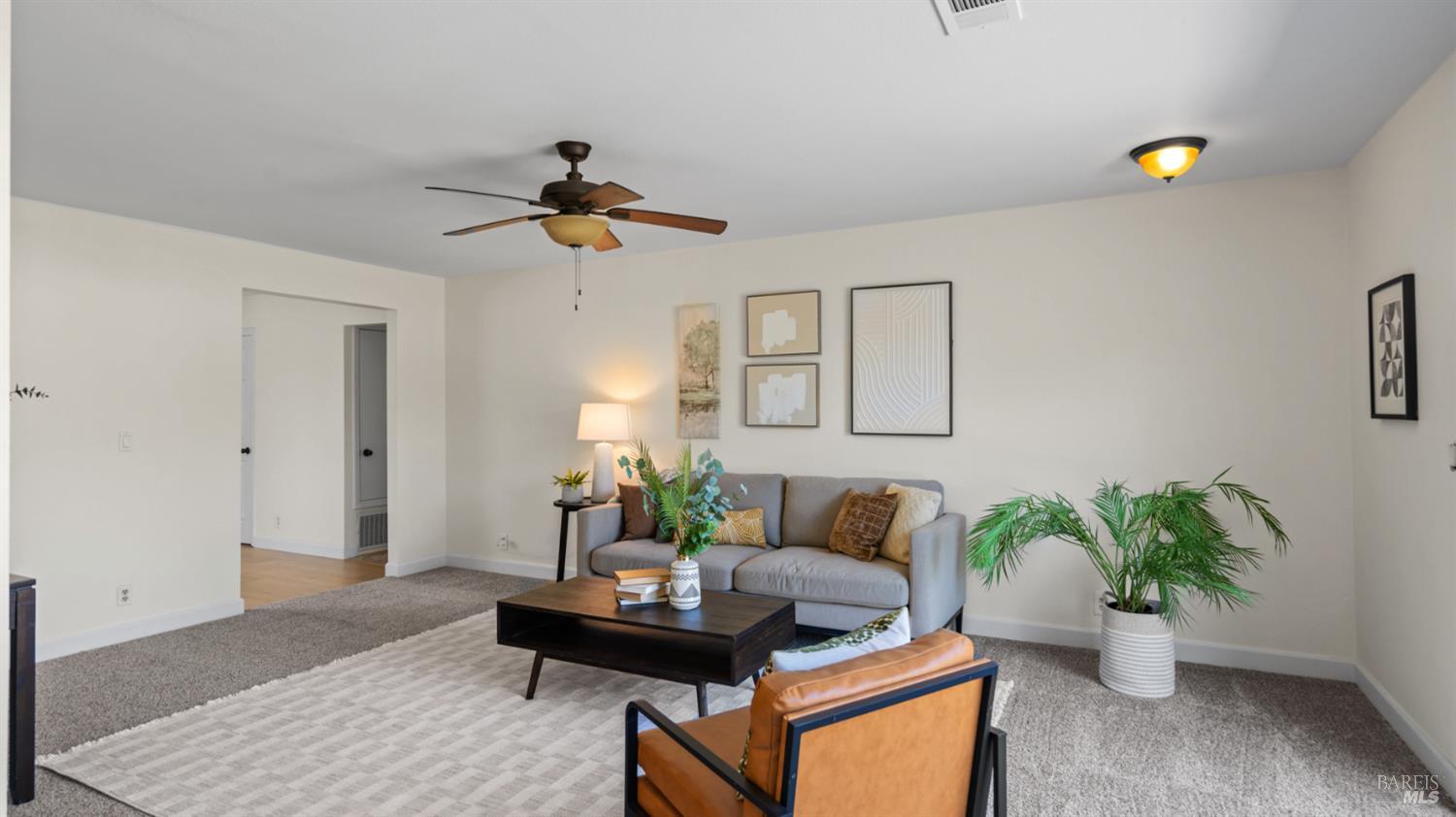 1312 Sutter Court Fairfield, CA 94533 - Photo 26 of 45 a living room with furniture and a potted plant