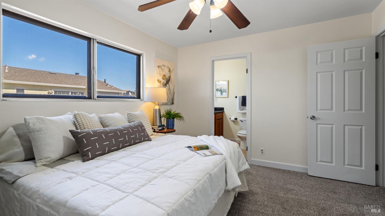 1312 Sutter Court Fairfield, CA 94533 - Photo 35 of 45 a large bed sitting in a bedroom next to a cabinet