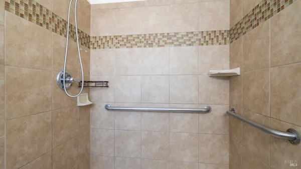 a view of backyard of house with green space