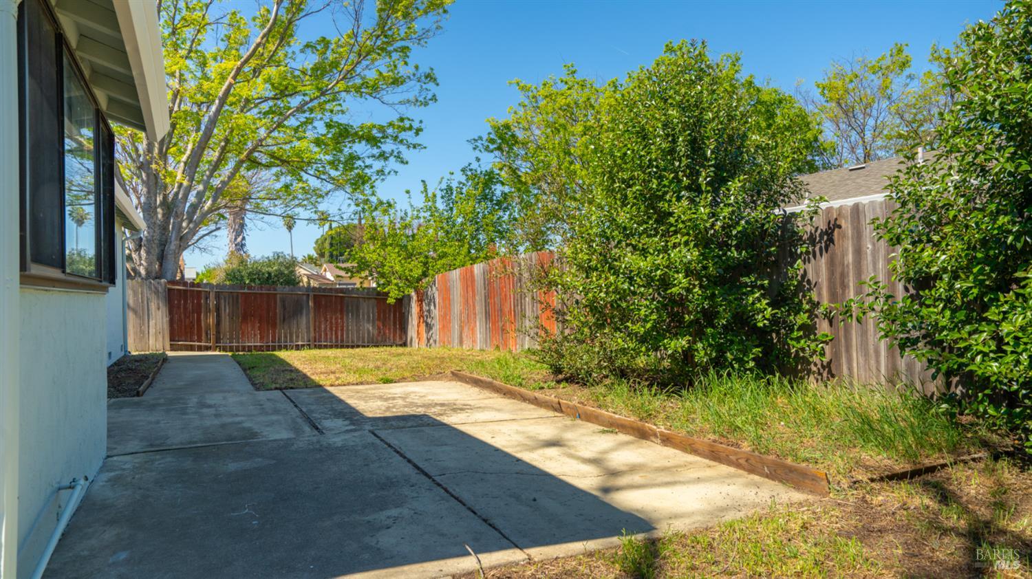 1312 Sutter Court Fairfield, CA 94533 - Photo 44 of 45 a view of backyard of house with green space