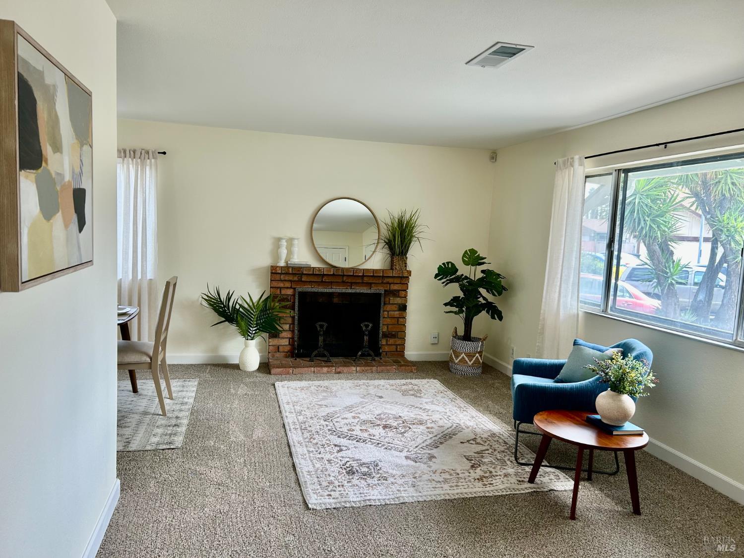 1312 Sutter Court Fairfield, CA 94533 - Photo 9 of 45 a living room with furniture and a fireplace