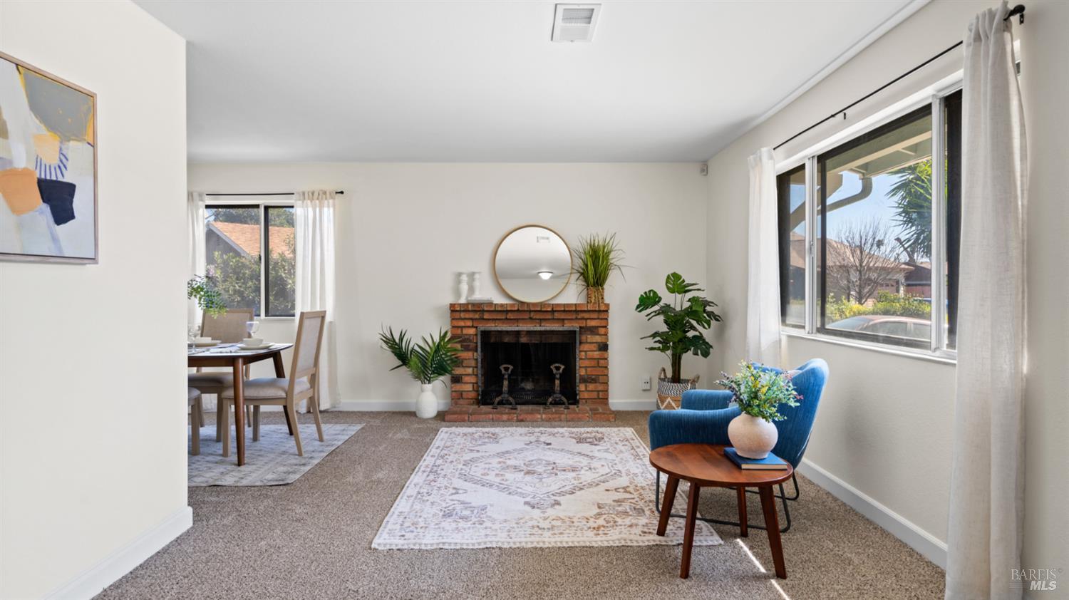 1312 Sutter Court Fairfield, CA 94533 - Photo 10 of 45 a view of a livingroom with furniture and a potted plant