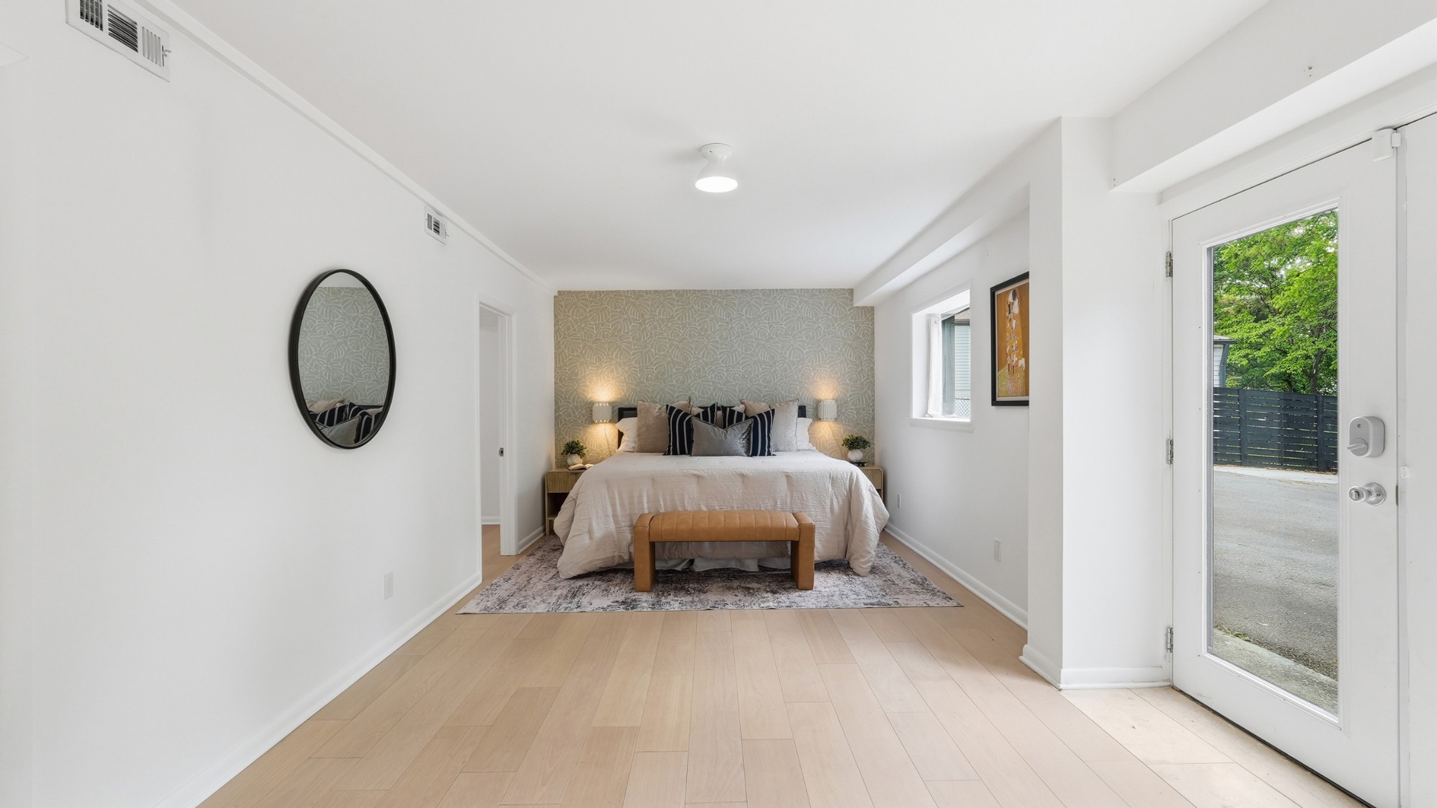 2101 Porter Road Nashville, TN 37216 - Photo 19 of 48 a spacious bedroom with a bed and a window
