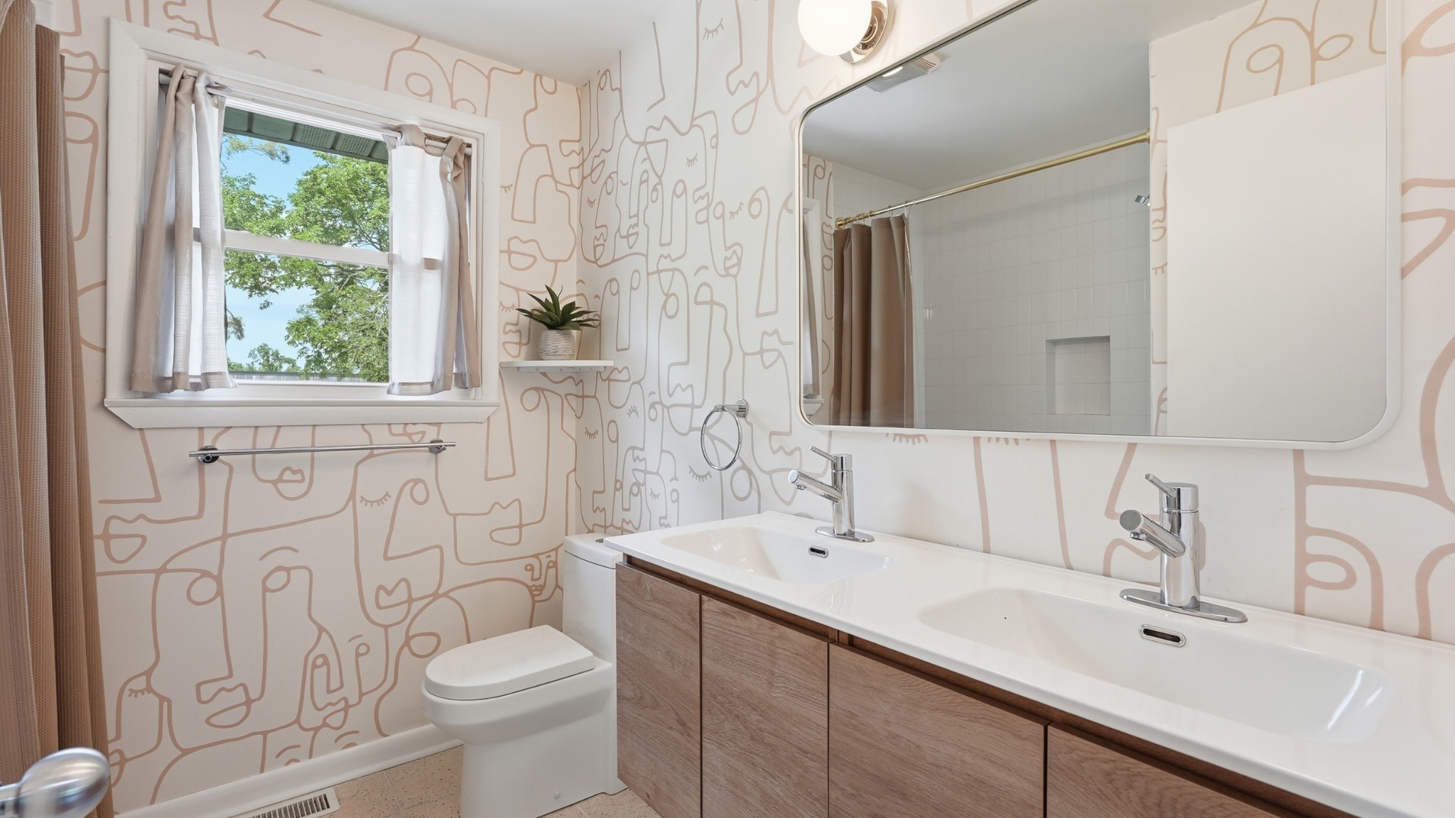 2101 Porter Road Nashville, TN 37216 - Photo 25 of 48 a bathroom with a sink and a mirror