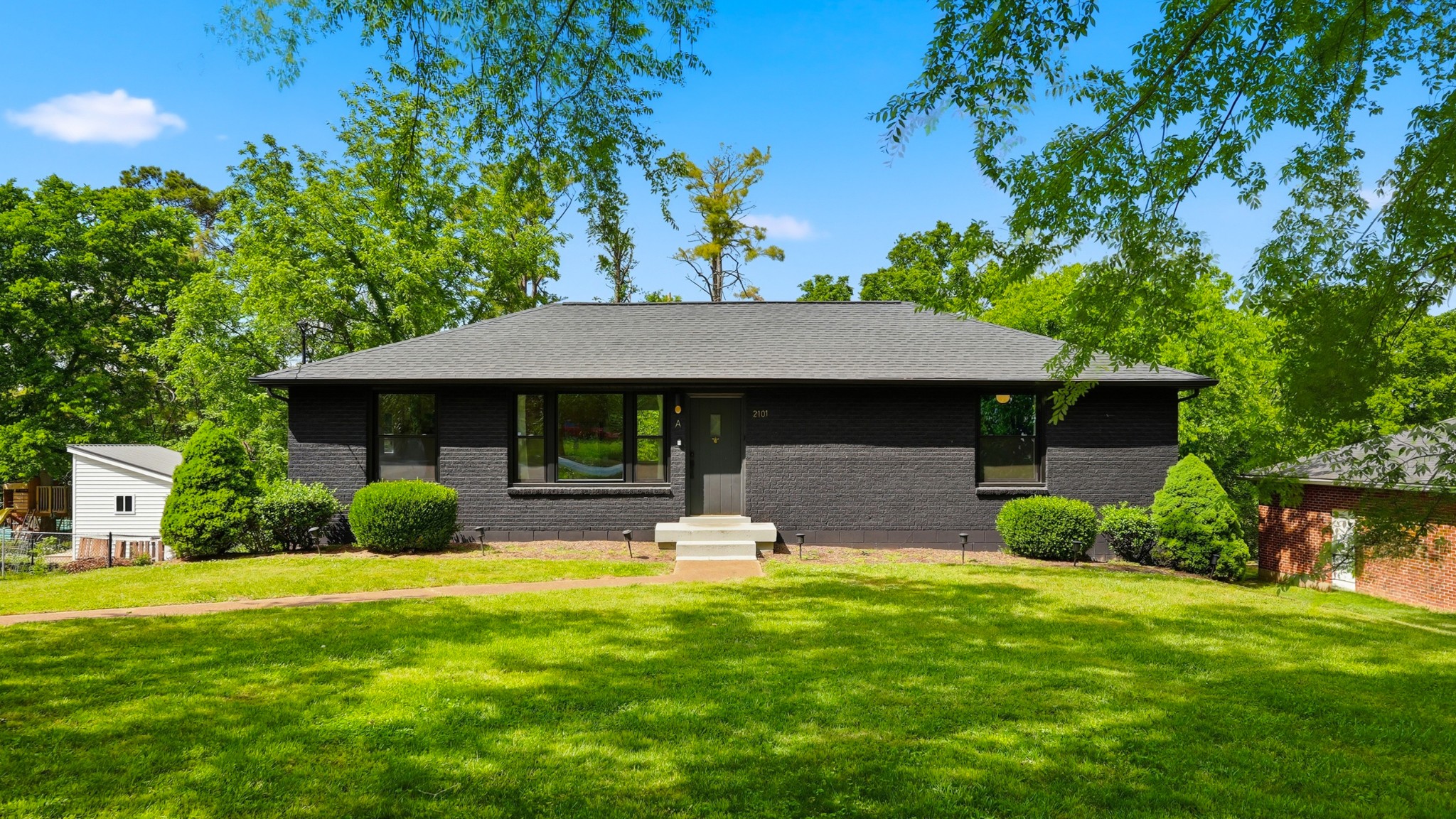 2101 Porter Road Nashville, TN 37216 - Photo 44 of 48 a front view of a house with garden