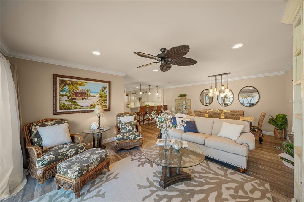 4660 Ocean Boulevard, Unit O2 Sarasota, FL 34242 - Photo 21 of 55 a living room with furniture and a large window