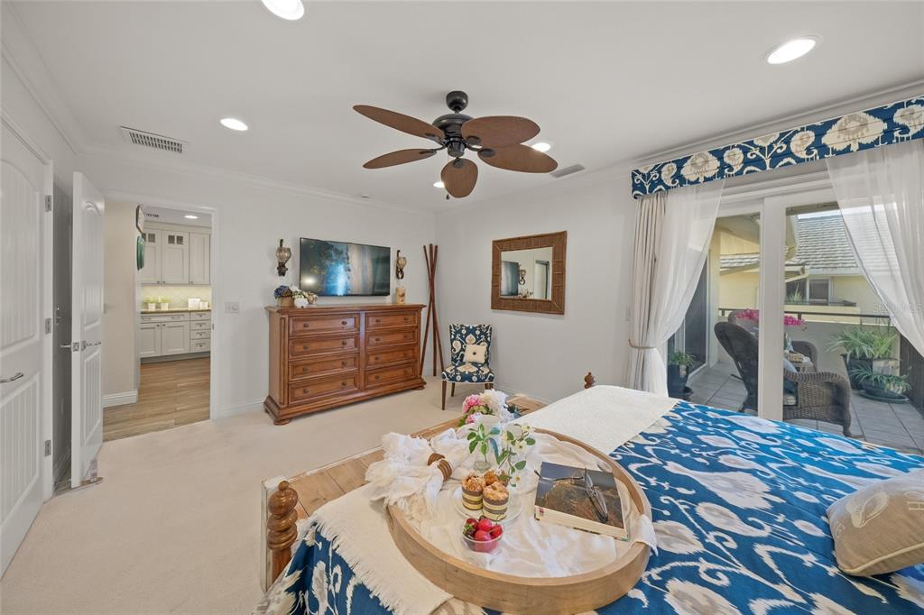 4660 Ocean Boulevard, Unit O2 Sarasota, FL 34242 - Photo 36 of 55 a living room with furniture and a wooden floor