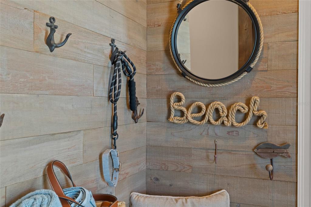 4660 Ocean Boulevard, Unit O2 Sarasota, FL 34242 - Photo 45 of 55 a bathroom with a shower and mirror