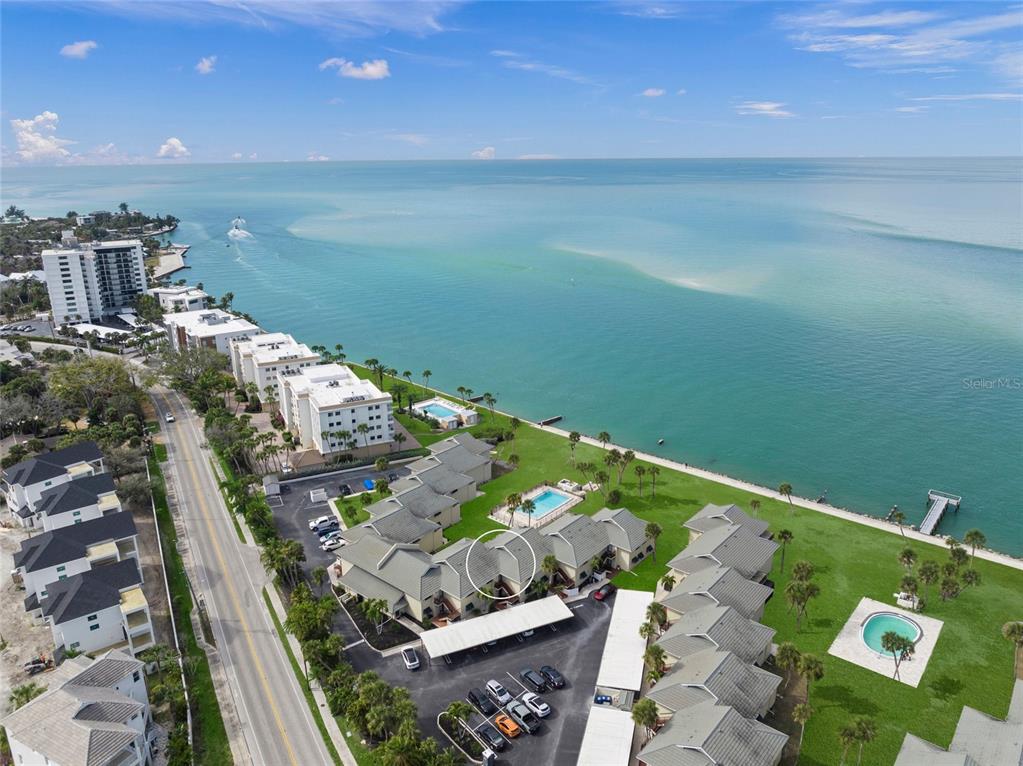 4660 Ocean Boulevard, Unit O2 Sarasota, FL 34242 - Photo 48 of 55 a view of a balcony with an ocean view