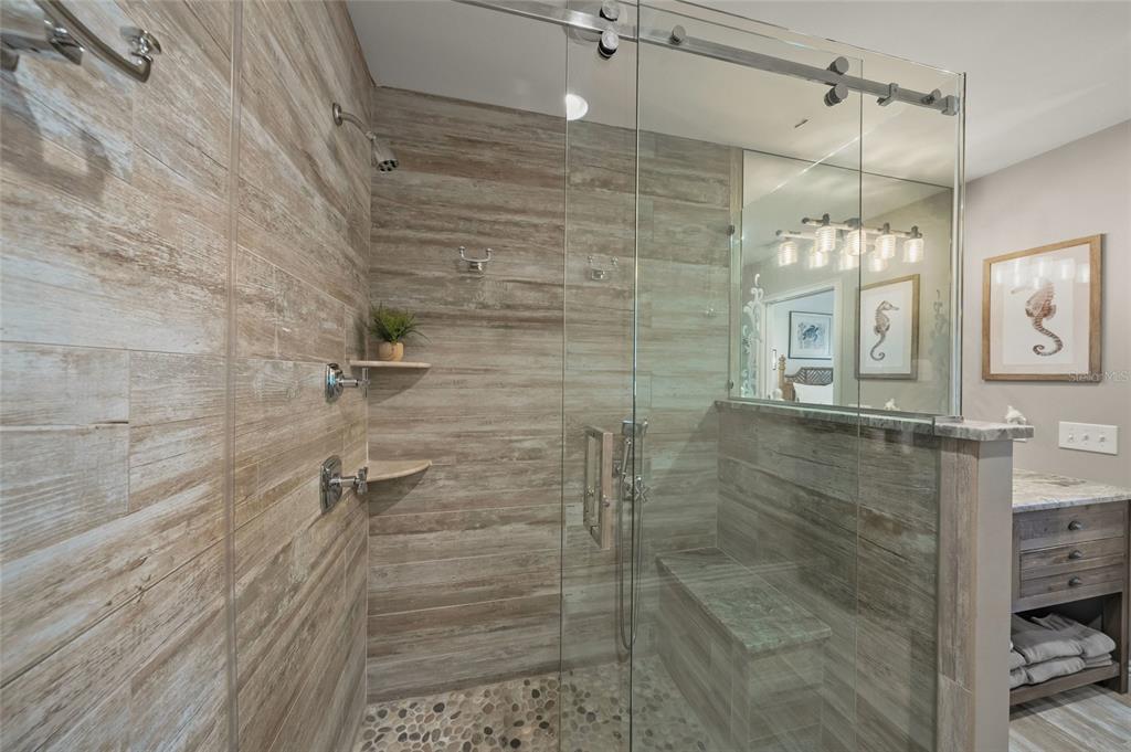 4660 Ocean Boulevard, Unit O2 Sarasota, FL 34242 - Photo 5 of 55 a bathroom with a shower