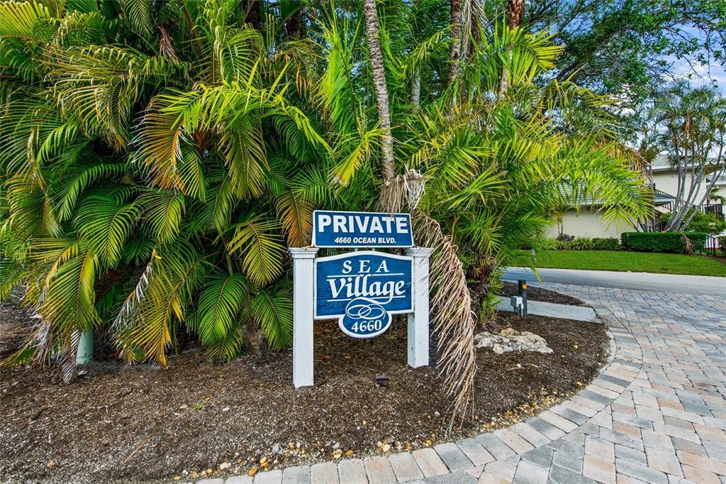 4660 Ocean Boulevard, Unit O2 Sarasota, FL 34242 - Photo 8 of 55 a sign broad on the side of the road