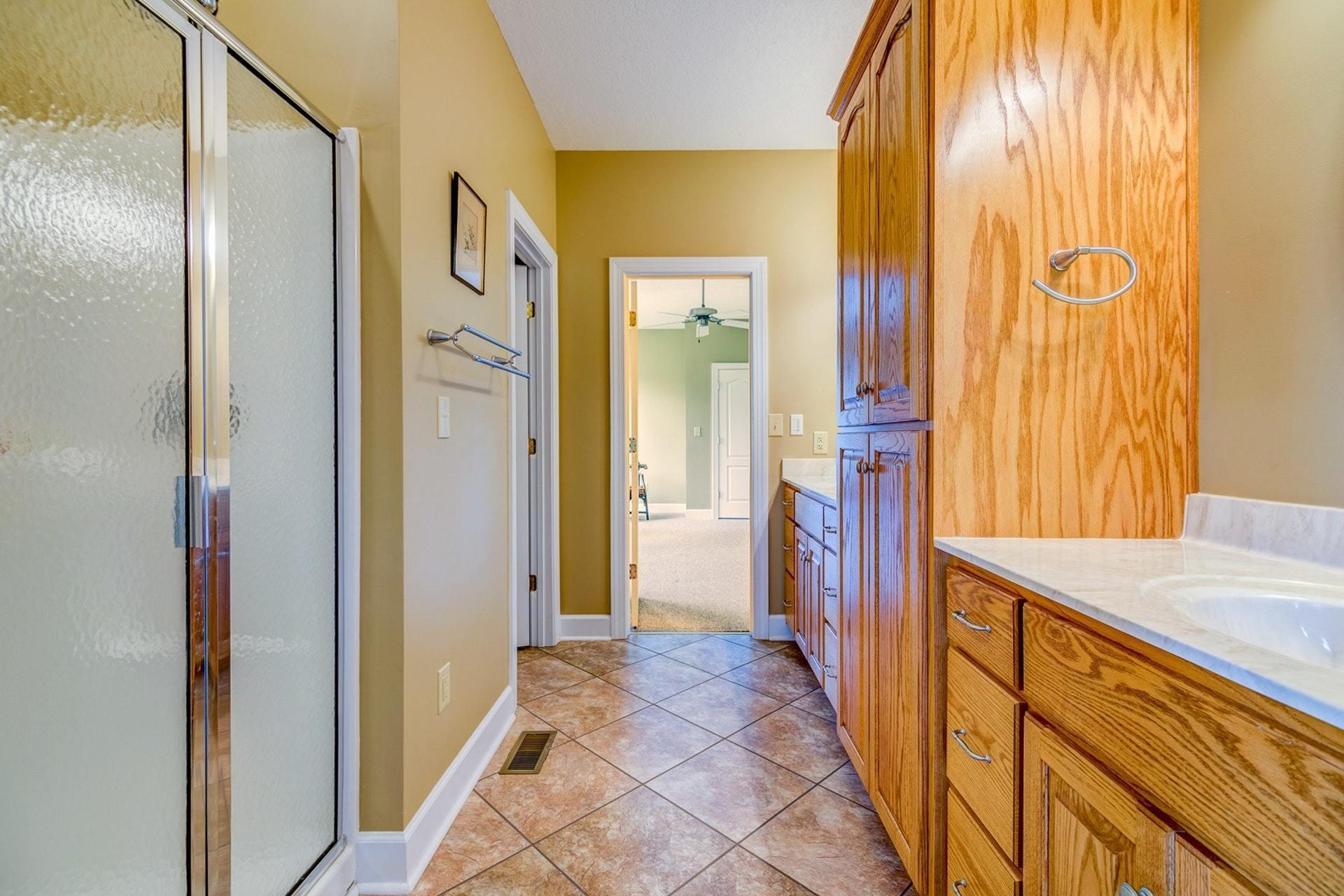 2774 Republican Church Road Ferrum, VA 24088 - Photo 11 of 52 a view of a hallway with wooden floor and cabinet