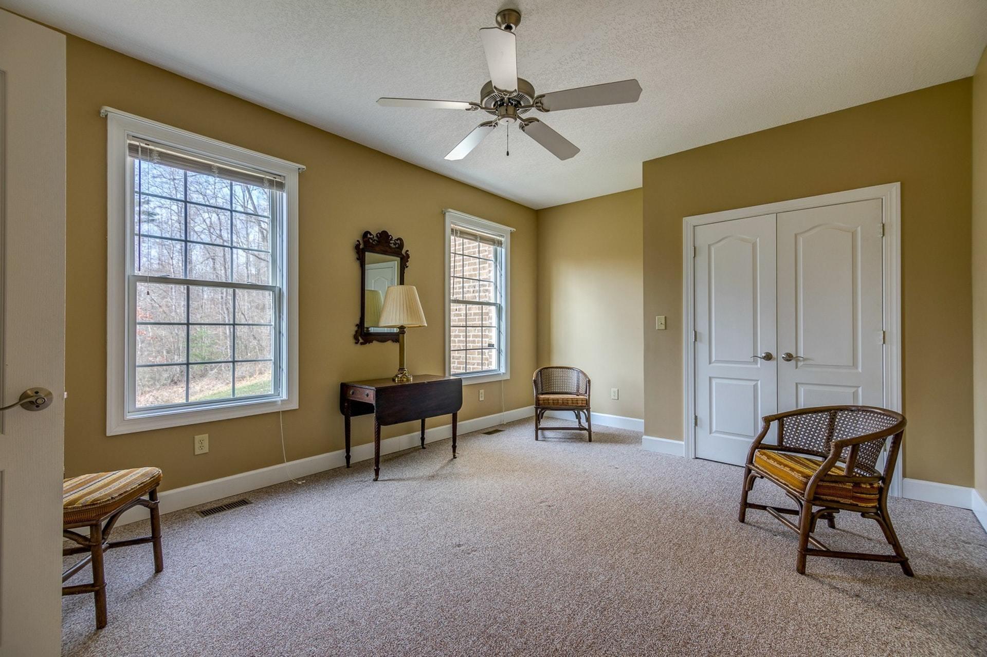 2774 Republican Church Road Ferrum, VA 24088 - Photo 12 of 52 a view of a livingroom with workspace and a window
