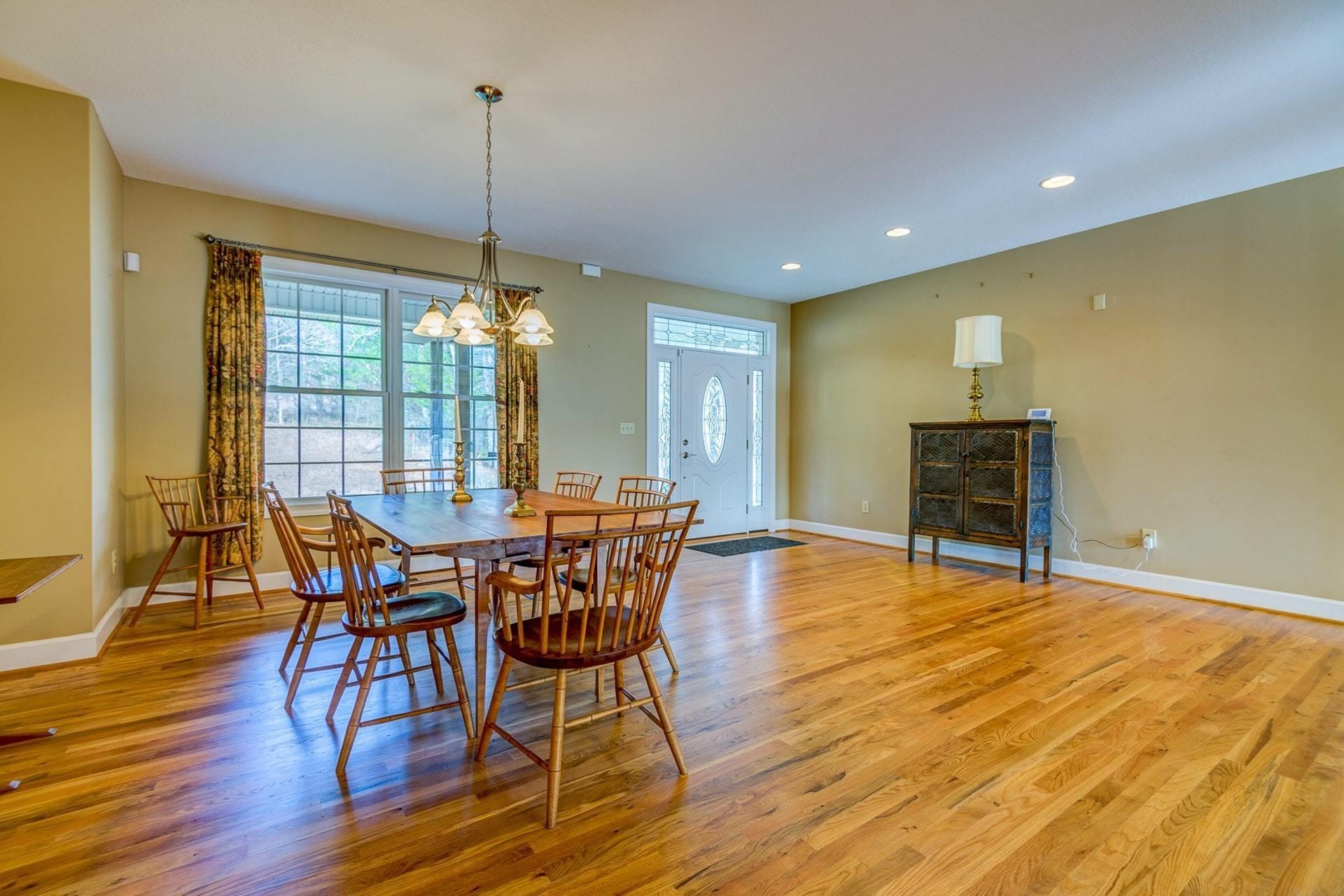 2774 Republican Church Road Ferrum, VA 24088 - Photo 4 of 52 a view of a dining room with furniture and wooden floor