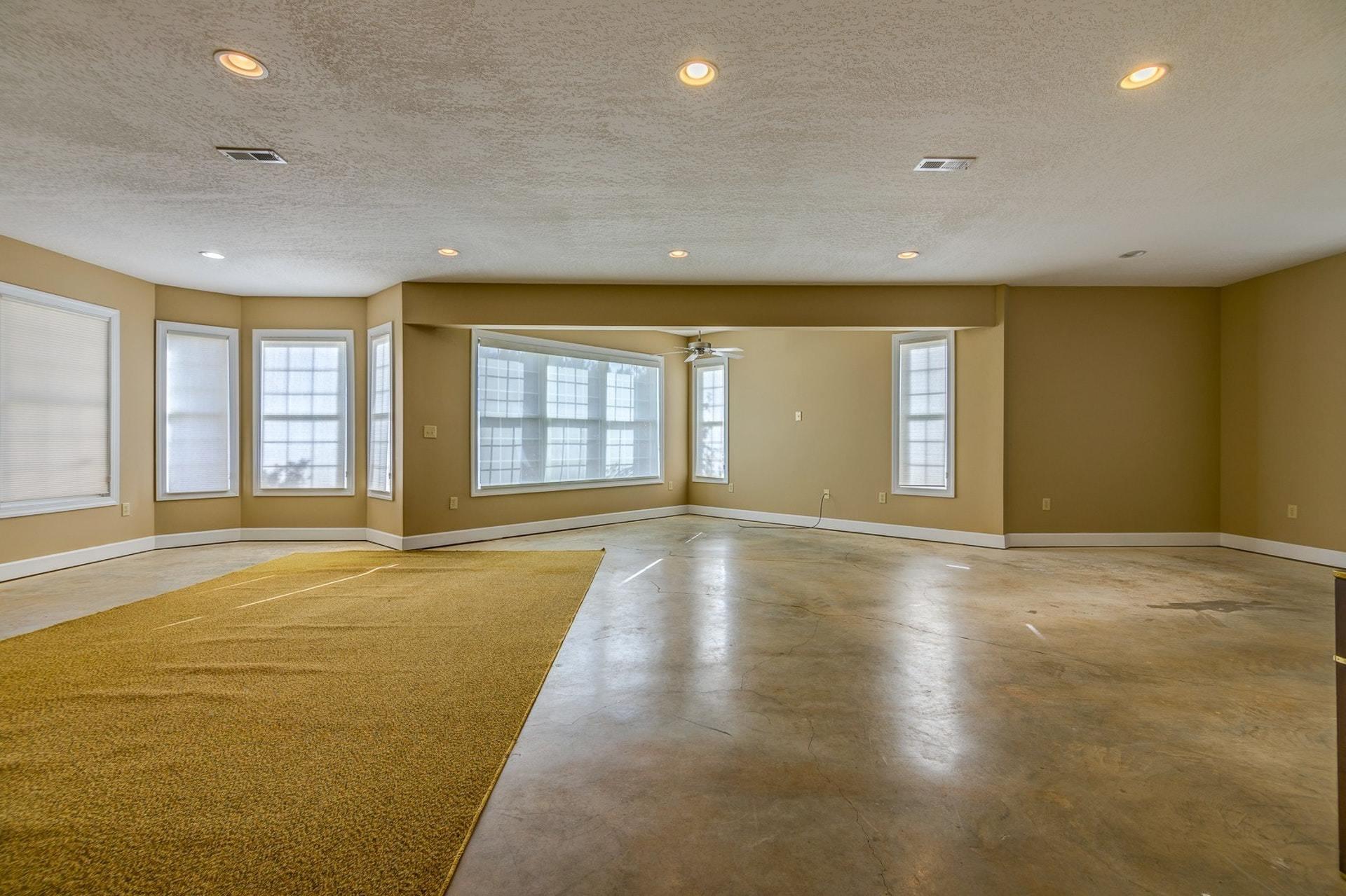 2774 Republican Church Road Ferrum, VA 24088 - Photo 41 of 52 an empty room with wooden floor and windows