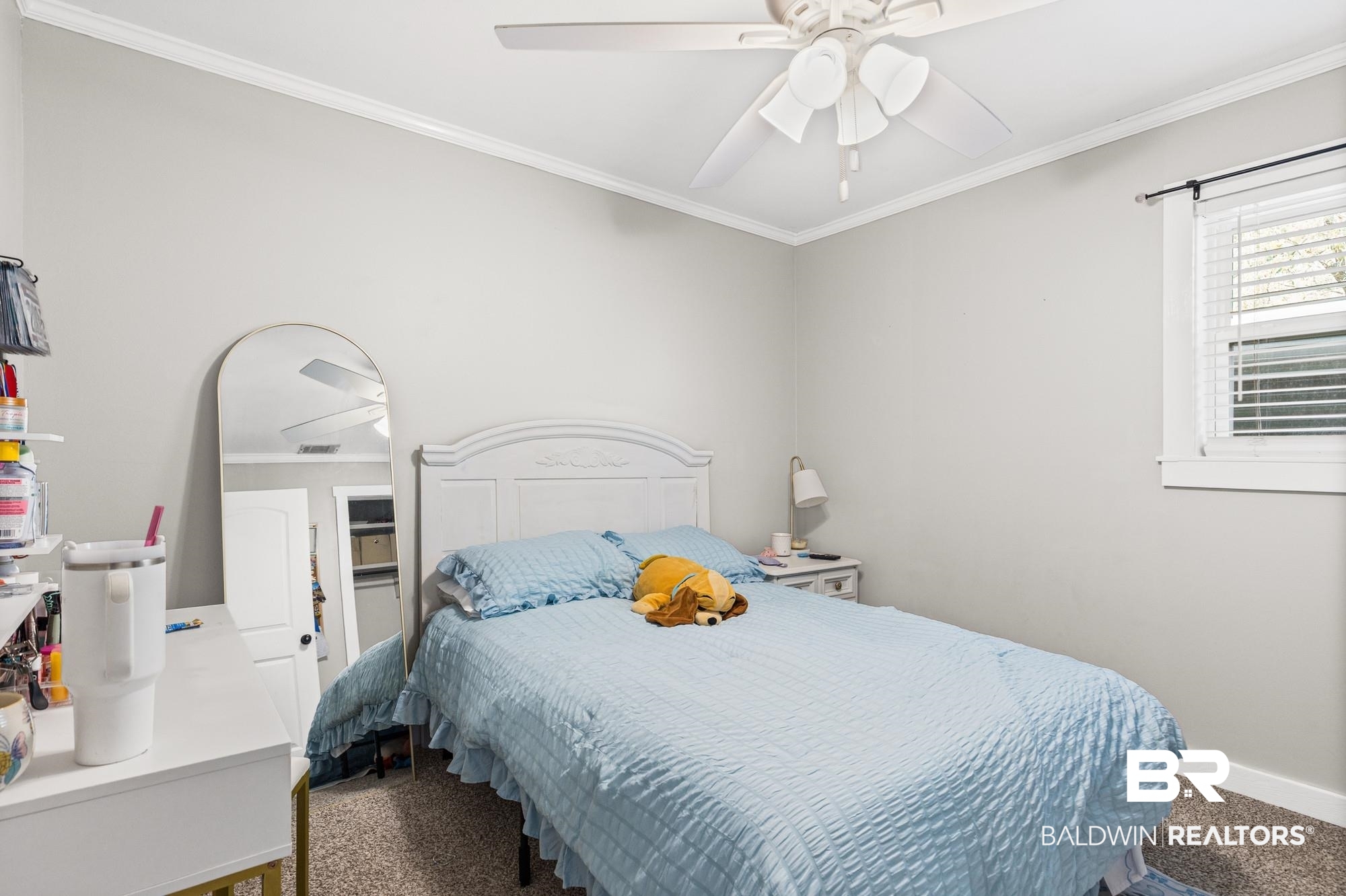 11100 Rhett McConnell Road Theodore, AL 36582 - Photo 17 of 47 Carpeted bedroom with ornamental molding and a ceiling fan