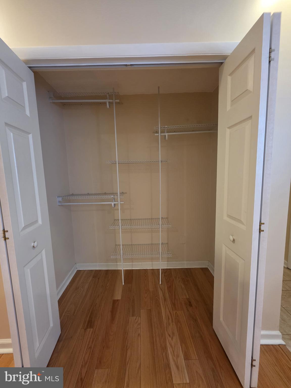 1153 South 11th Street, Unit A Philadelphia, PA 19147 - Photo 7 of 12 a view of a room with wooden floors and led lights
