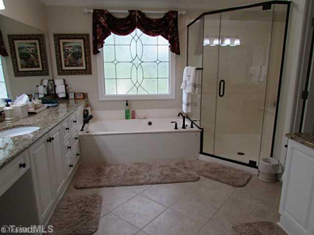 1240 Hauser Road Pinnacle, NC 27043 - Photo 13 of 16 Master Bath/Spa. Huge Master Bath w/granite vanities,jacuzzi tub,sep.shower