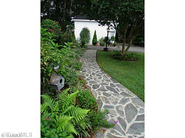 1240 Hauser Road Pinnacle, NC 27043 - Photo 16 of 16 Landscaping. Gorgeous yard & landscpaing!