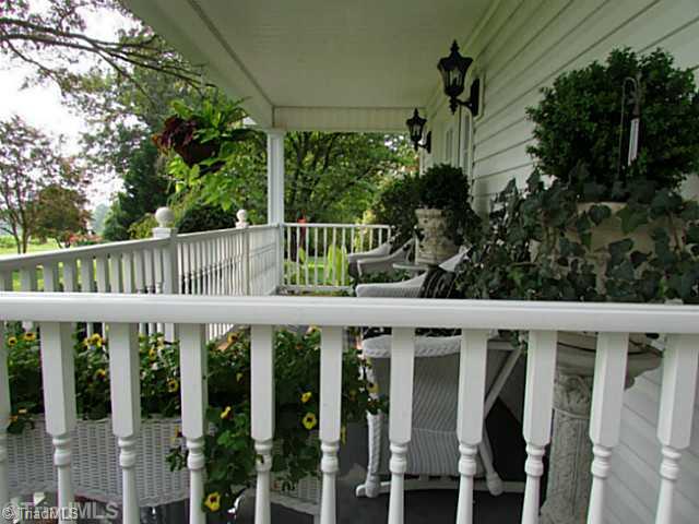 1240 Hauser Road Pinnacle, NC 27043 - Photo 5 of 16 Patio/Deck. Bring your swing & rocking chairs!