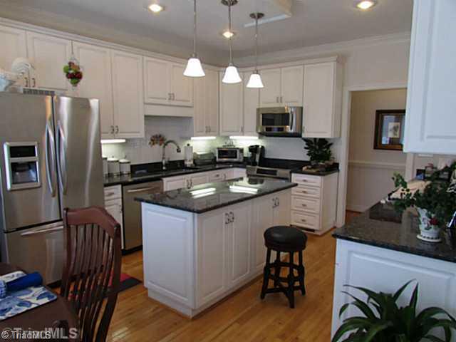 1240 Hauser Road Pinnacle, NC 27043 - Photo 9 of 16 Kitchen. Every womans dream kitchen! Stainless appliances,island,pantry,granite,conv.oven & more!