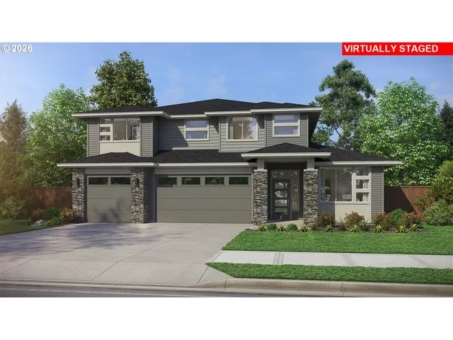 a front view of a house with a garden