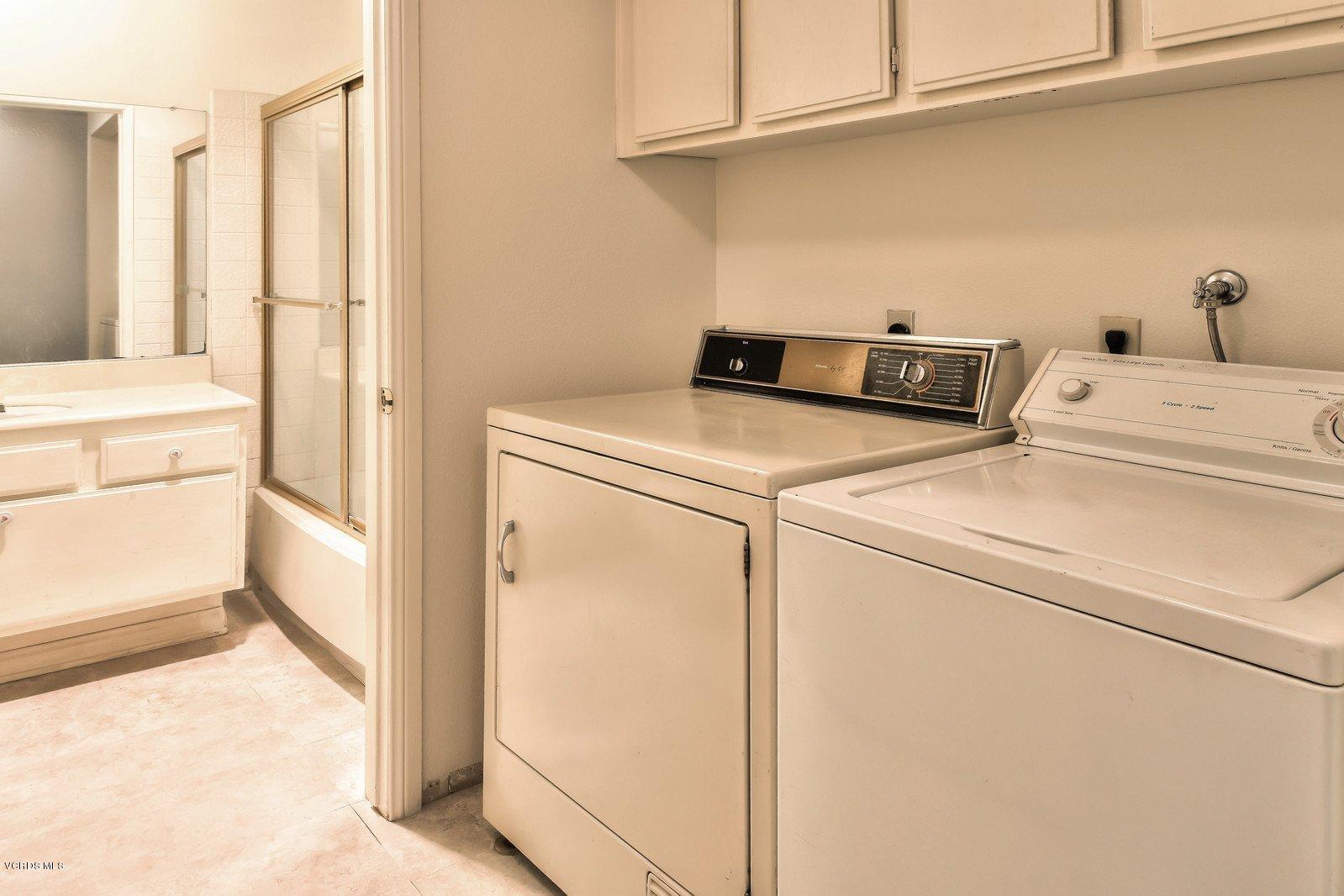 547 Spring Road, Unit 33 Moorpark, CA 93021 - Photo 23 of 28 a utility room with dryer and washer