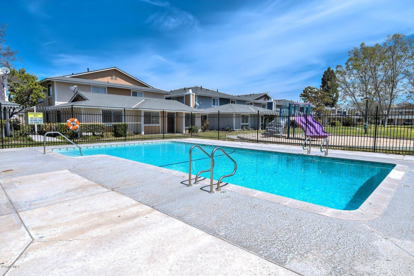 547 Spring Road, Unit 33 Moorpark, CA 93021 - Photo 27 of 28 a view of a house with a swimming pool