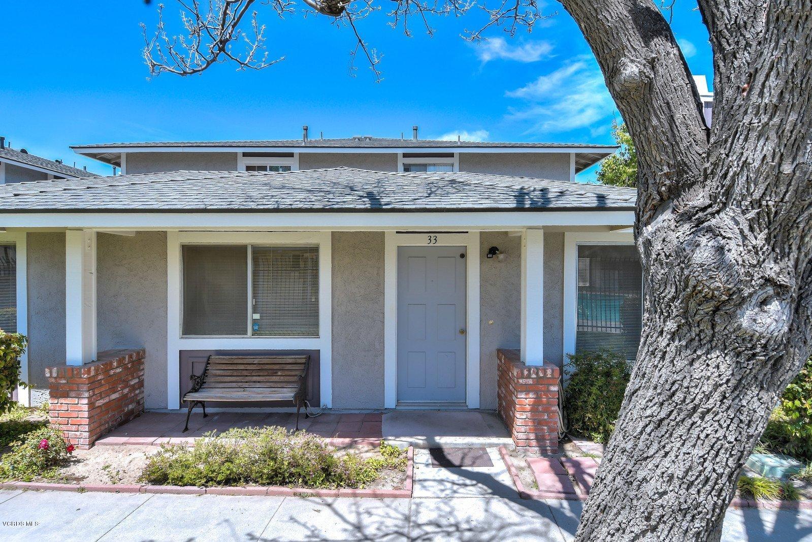 547 Spring Road, Unit 33 Moorpark, CA 93021 - Photo 4 of 28 a front view of a house with garden