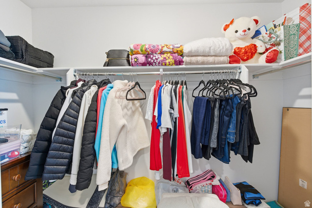 3808 Galatia Road Magna, UT 84044 - Photo 22 of 59 Corner closet featuring white shelving and hanging rods