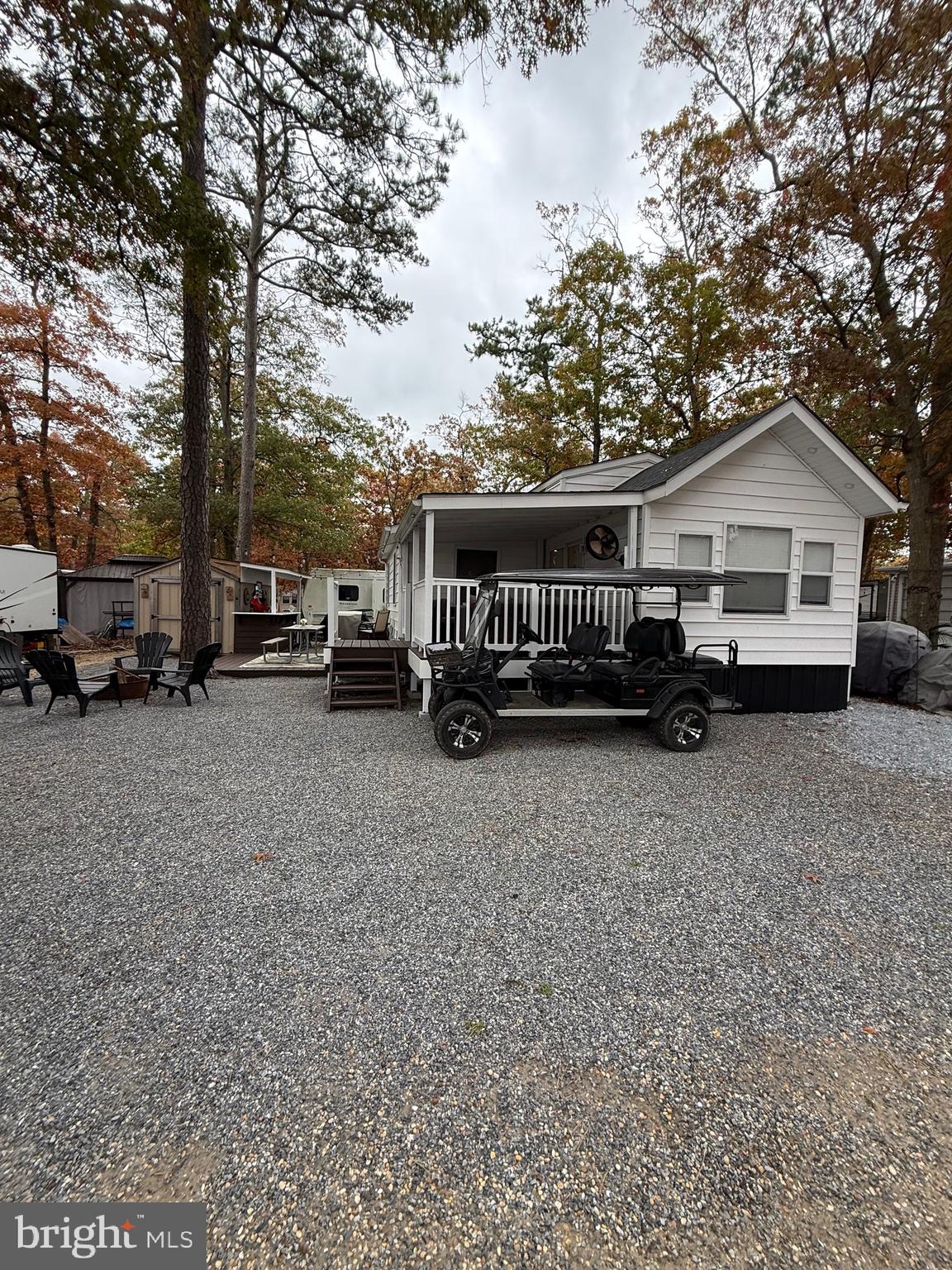 515 Corsons Tavern Road, Unit D22 Ocean View, NJ 08230 - Photo 11 of 23 a car parked in front of a house