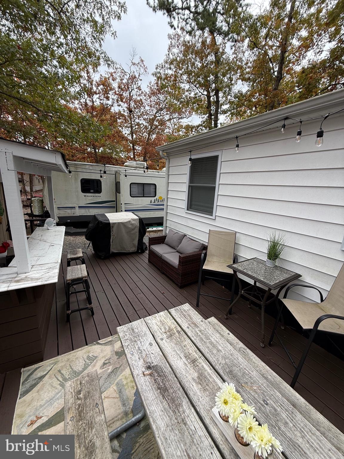 515 Corsons Tavern Road, Unit D22 Ocean View, NJ 08230 - Photo 15 of 23 a terrace of a house with outdoor seating