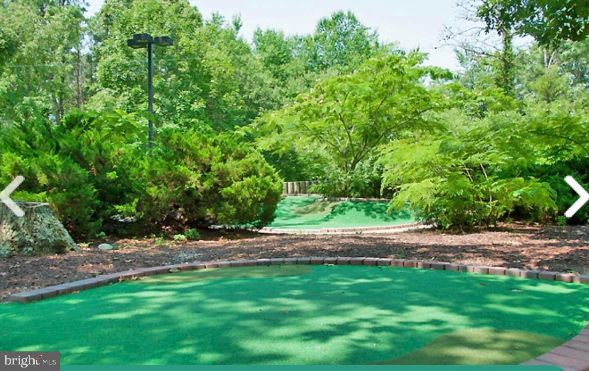 515 Corsons Tavern Road, Unit D22 Ocean View, NJ 08230 - Photo 22 of 23 a view of outdoor space with deck and yard