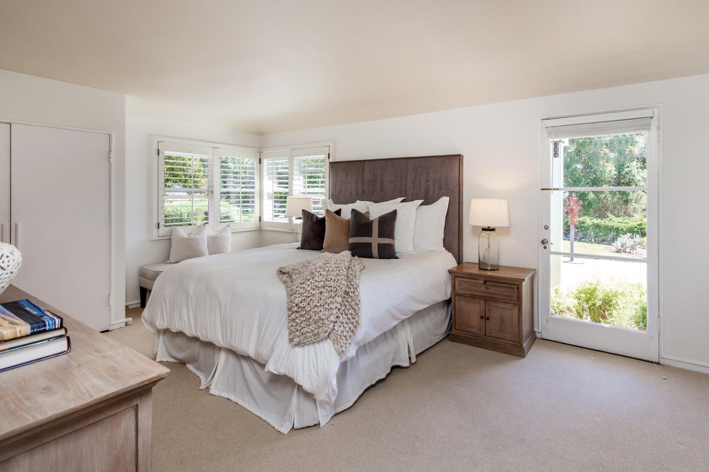 2885 Woodside Road Woodside, CA 94062 - Photo 11 of 19 a bedroom with a bed and a window