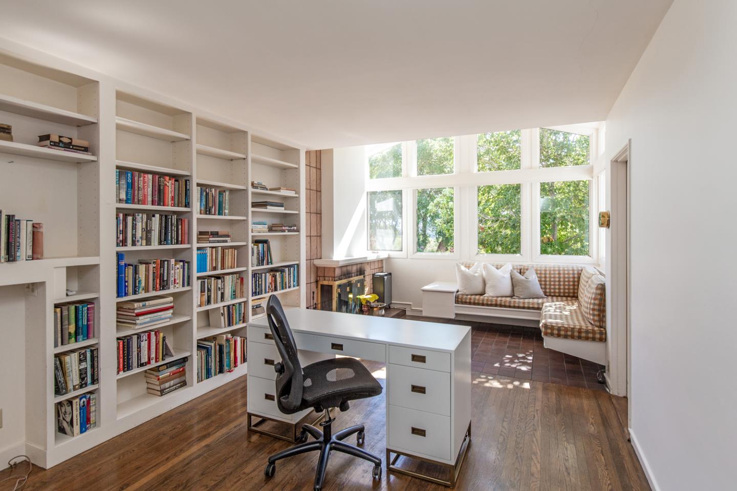 2885 Woodside Road Woodside, CA 94062 - Photo 10 of 19 a work room with furniture and a book shelf