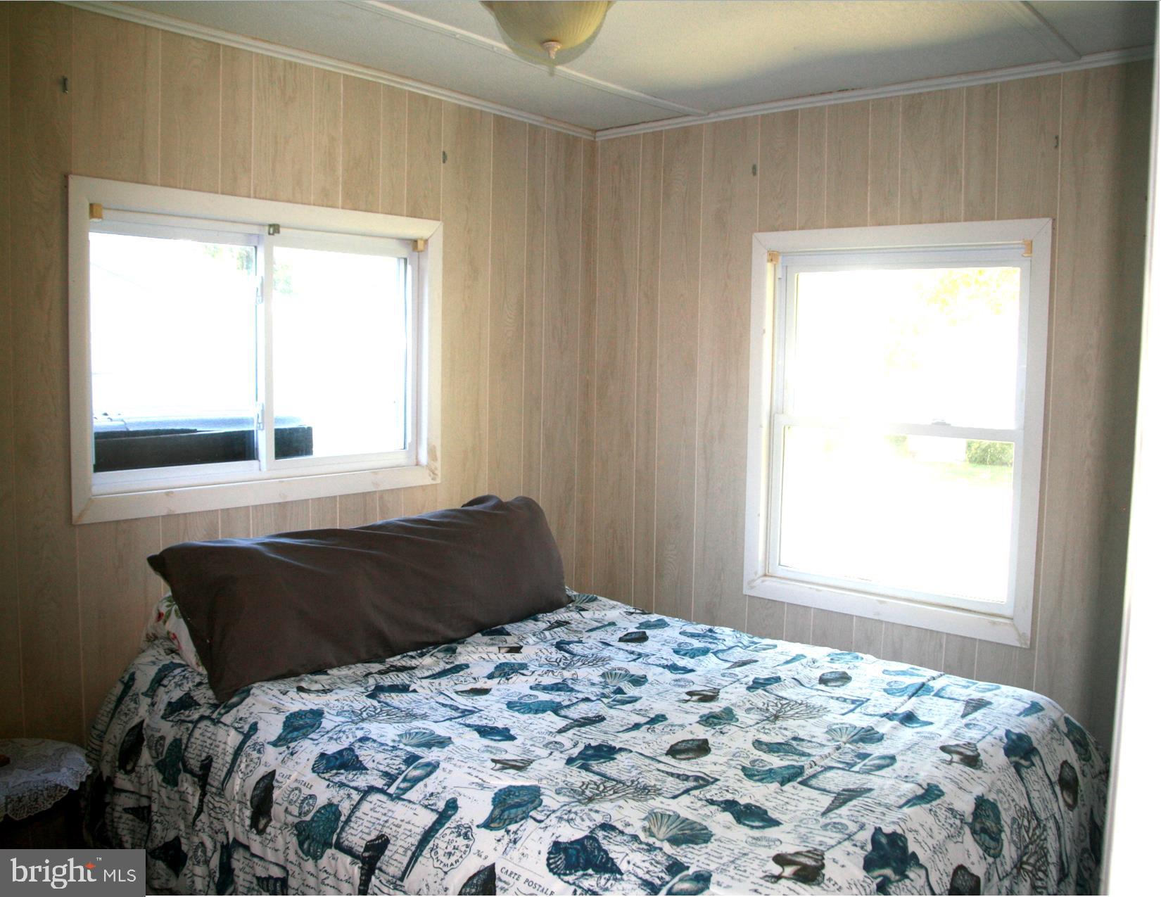 35317 Fishermans Road, Unit 5751 Millsboro, DE 19966 - Photo 22 of 34 Primary Bedroom