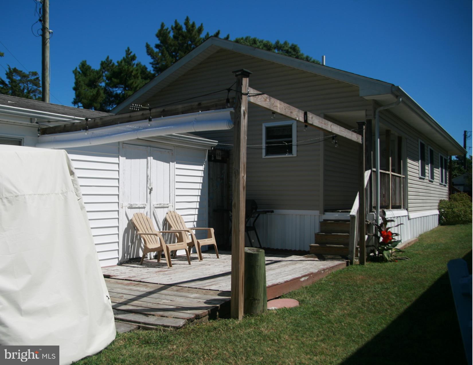 35317 Fishermans Road, Unit 5751 Millsboro, DE 19966 - Photo 7 of 34 Back deck view