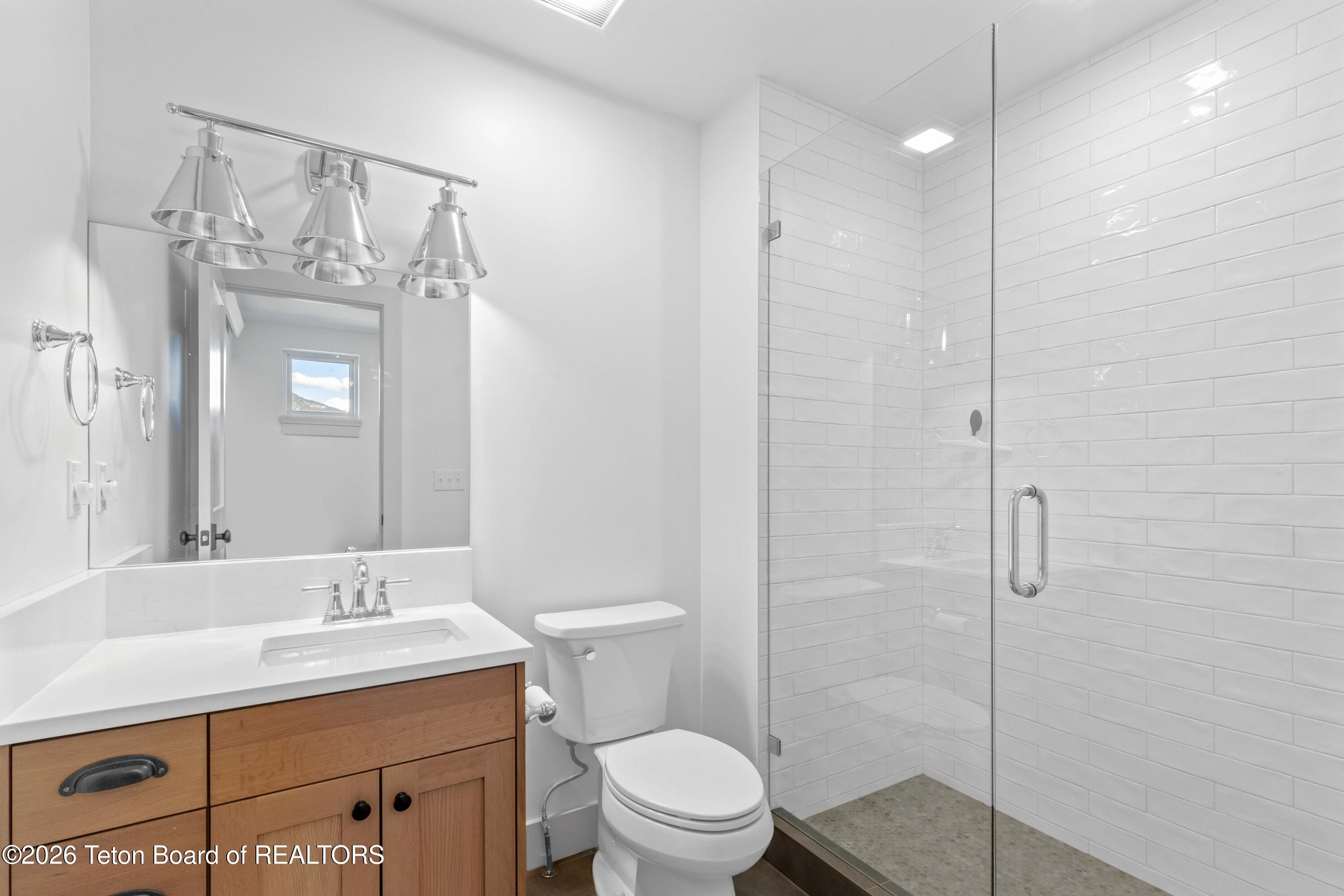 325 Columbine Street Alpine, WY 83128 - Photo 34 of 37 Madsenupperbathroom