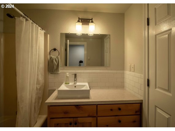 9010 Southeast Bull Run Road Corbett, OR 97019 - Photo 13 of 21 a bathroom with a sink vanity and a mirror