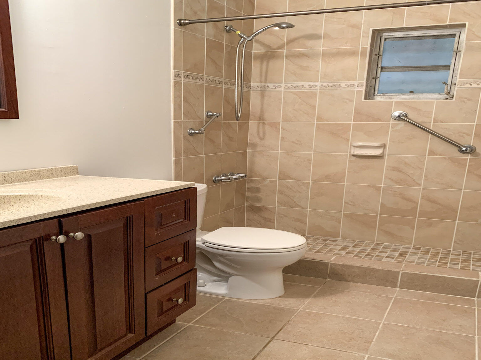 17 6th Avenue Stock Island, FL 33040 - Photo 21 of 28 a bathroom with a sink a toilet and shower
