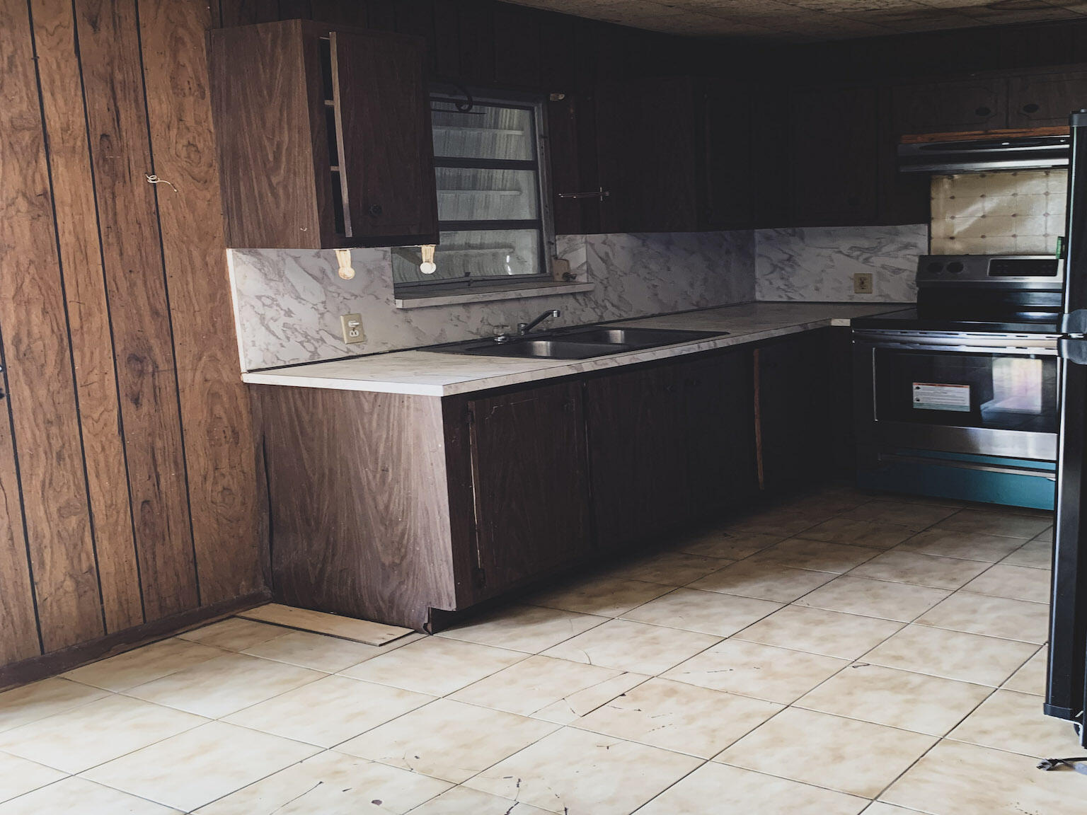 17 6th Avenue Stock Island, FL 33040 - Photo 8 of 28 a kitchen with a sink and cabinets
