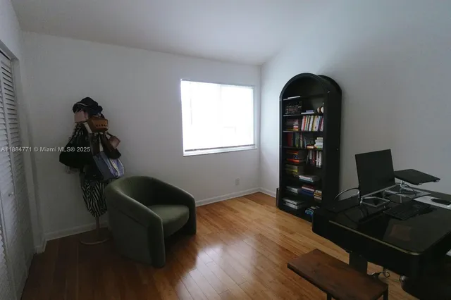 a workspace with furniture and a window