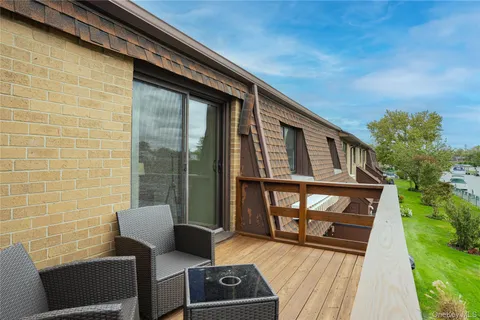 a view of a balcony with couch