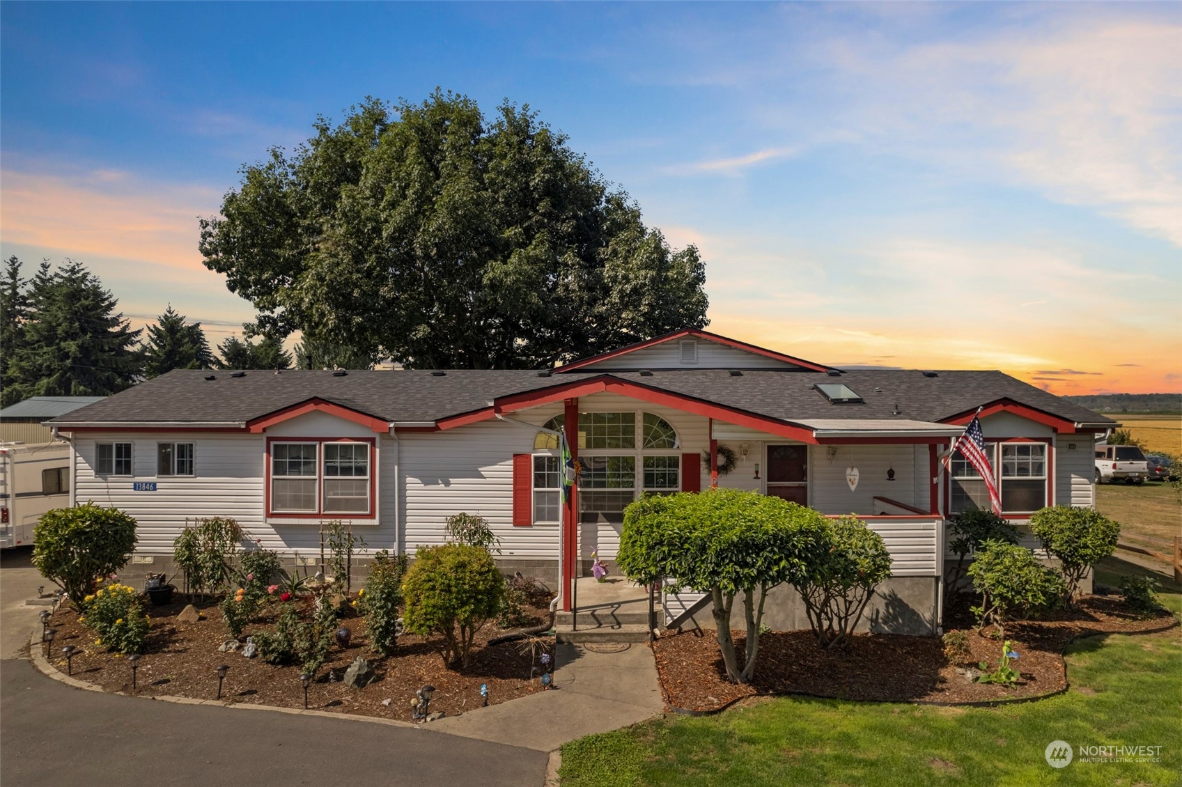 13846 Avon Allen Road Mount Vernon, WA 98273 - Photo 1 of 36 a front view of a house with yard and green space