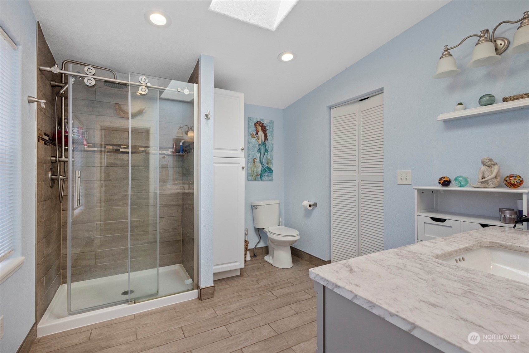 13846 Avon Allen Road Mount Vernon, WA 98273 - Photo 21 of 36 a bathroom with a shower sink and toilet