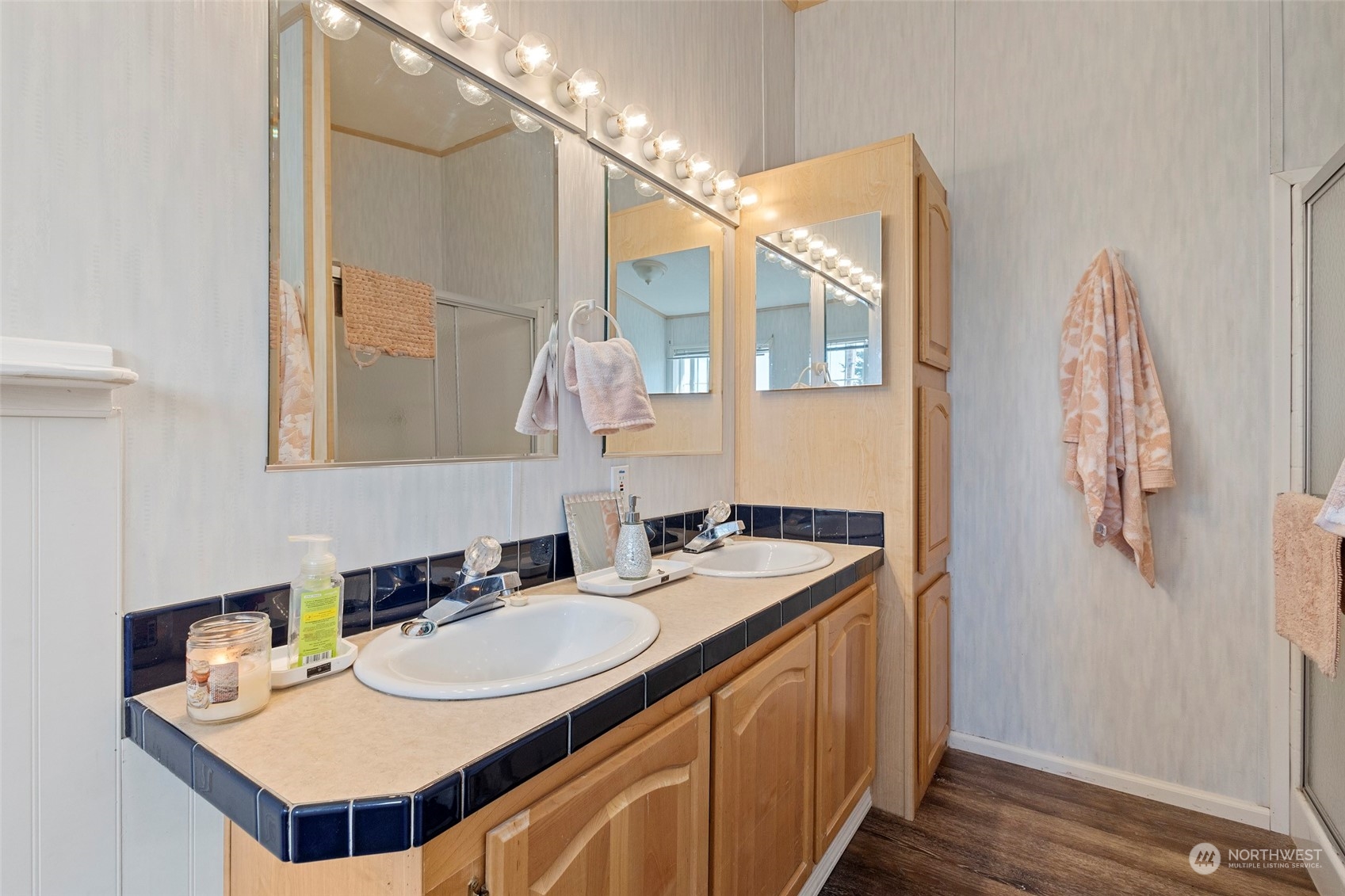 13846 Avon Allen Road Mount Vernon, WA 98273 - Photo 25 of 36 a bathroom with a sink and a mirror